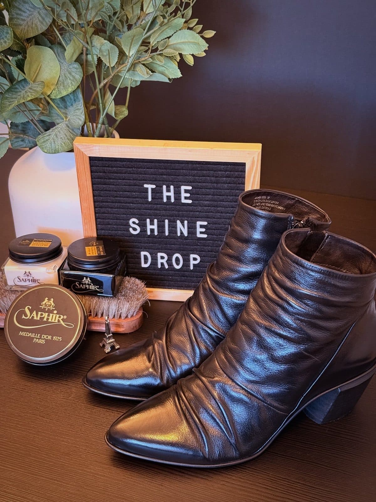 Black leather ankle boots after cleaning