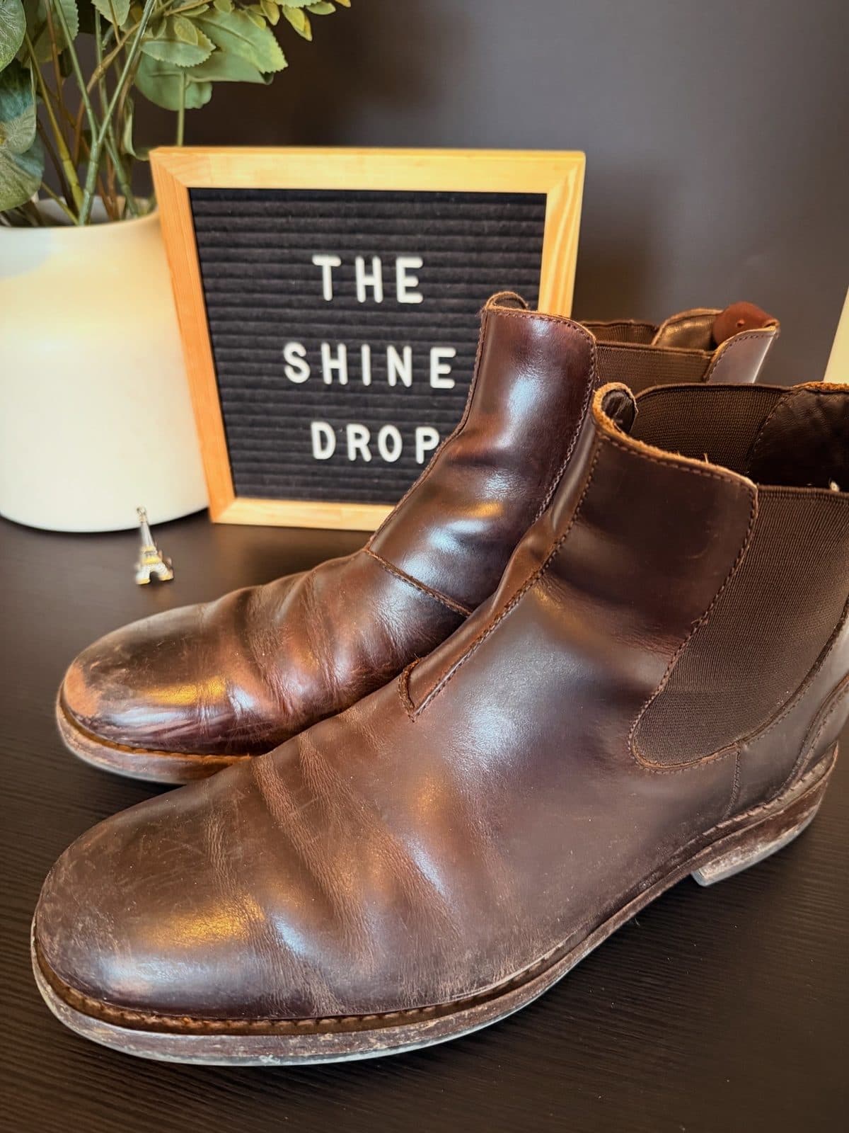 Brown leather Chelsea boots before cleaning