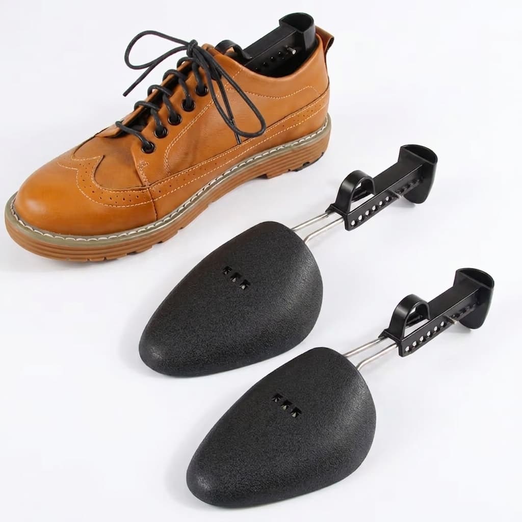 Brown leather brogue with cedar shoe trees — shoe care and shape restoration by The Shine Drop Calgary