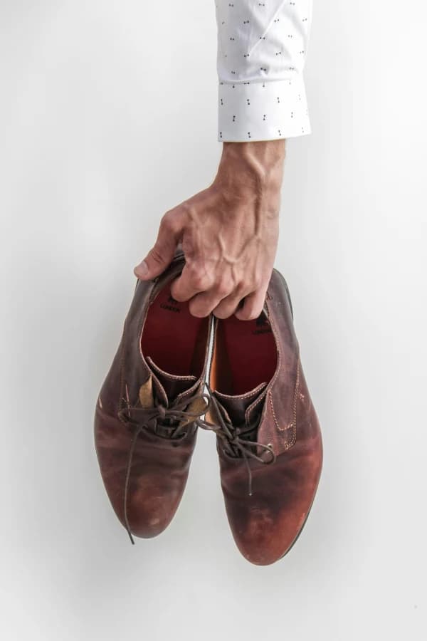 Worn leather shoes restored to life — professional shoe care Calgary